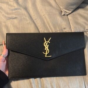 Yves Saint Laurent Black Clutch with Gold Logo
